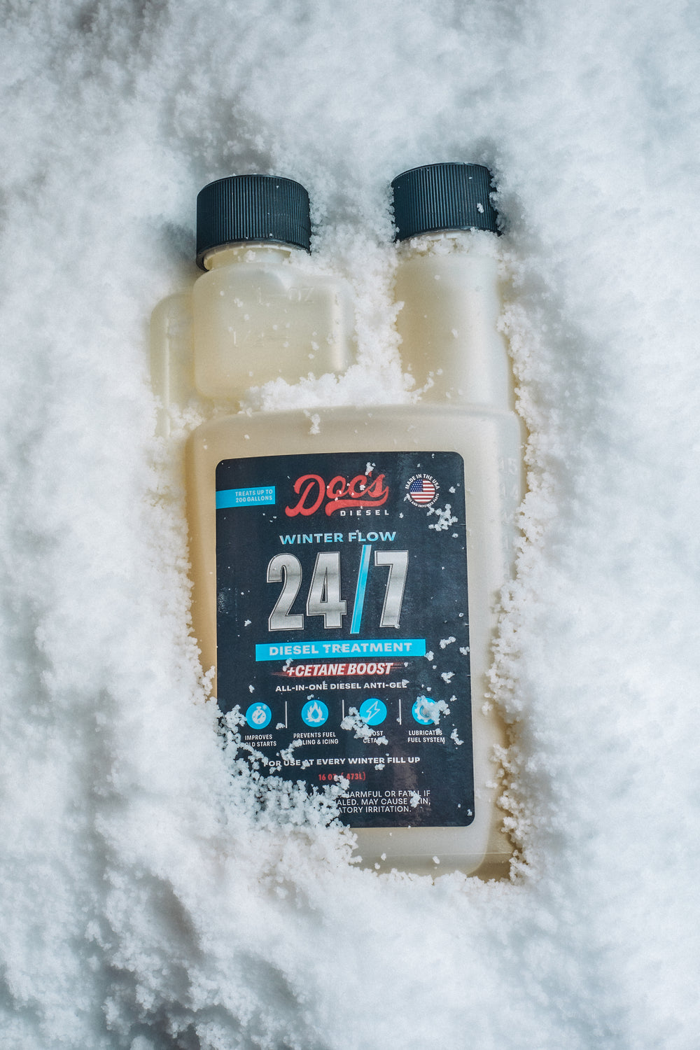 Winter Flow 24/7 bottle packed in snow