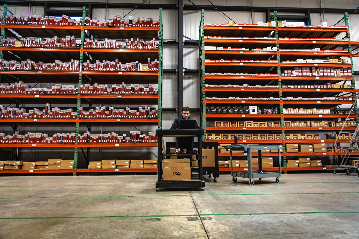 Shelves stacked with Doc's Diesel inventory