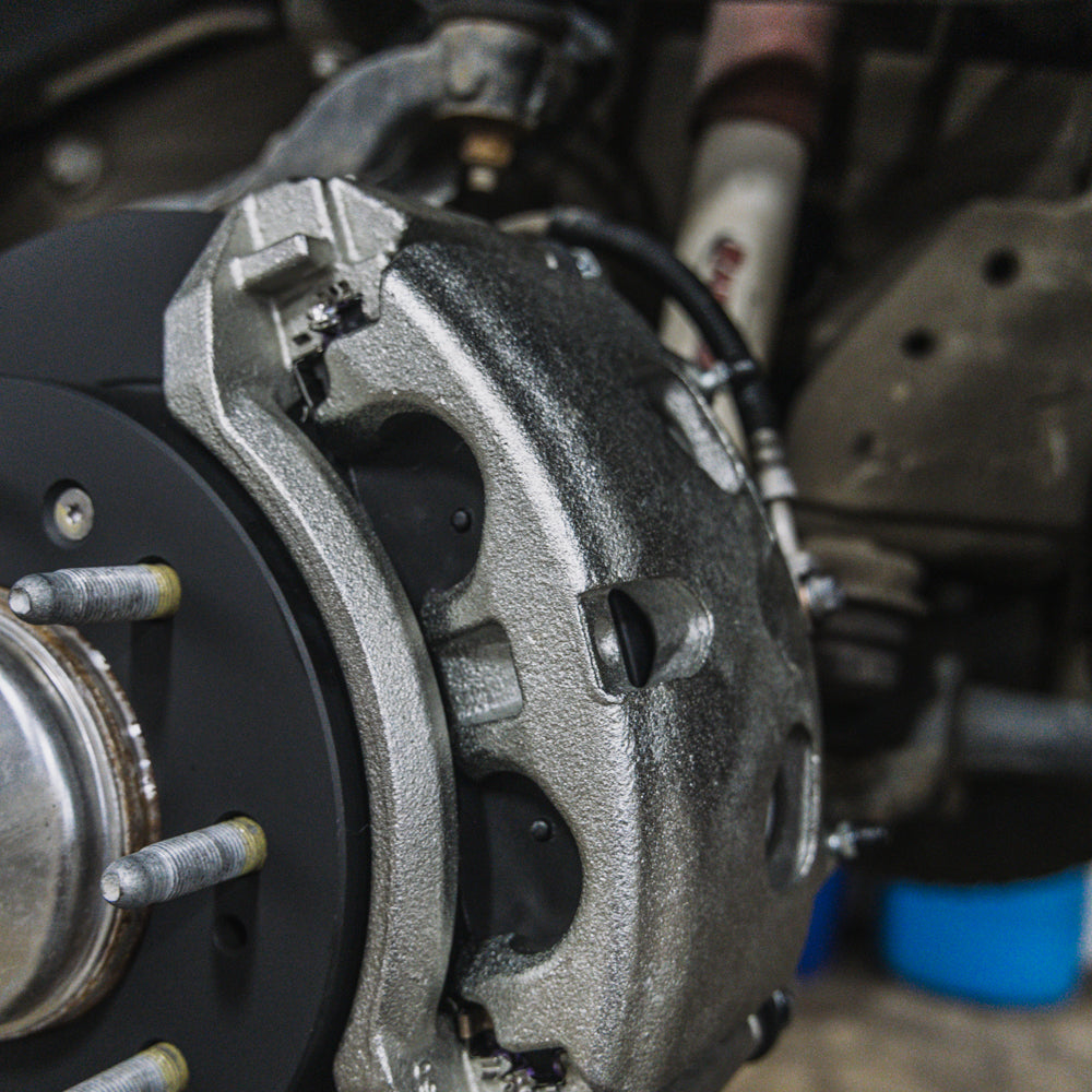 Doc's Diesel front brake caliper, rotor, pad, and hub kit for Chevy/GMC 6.6L Duramax 4WD SRW 2011-2019