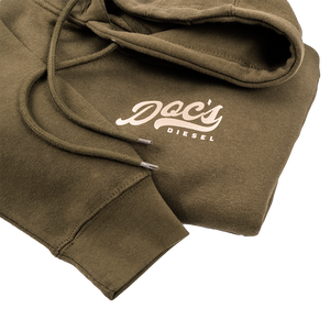 Doc's Staple Hoodie Army Green logo closeup