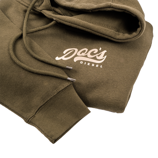 Doc's Staple Hoodie Army Green logo closeup