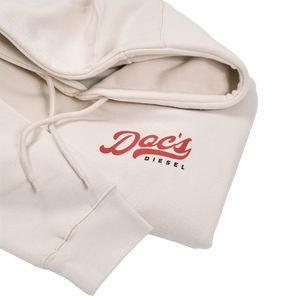 Doc's Staple Hoodie Tan logo closeup