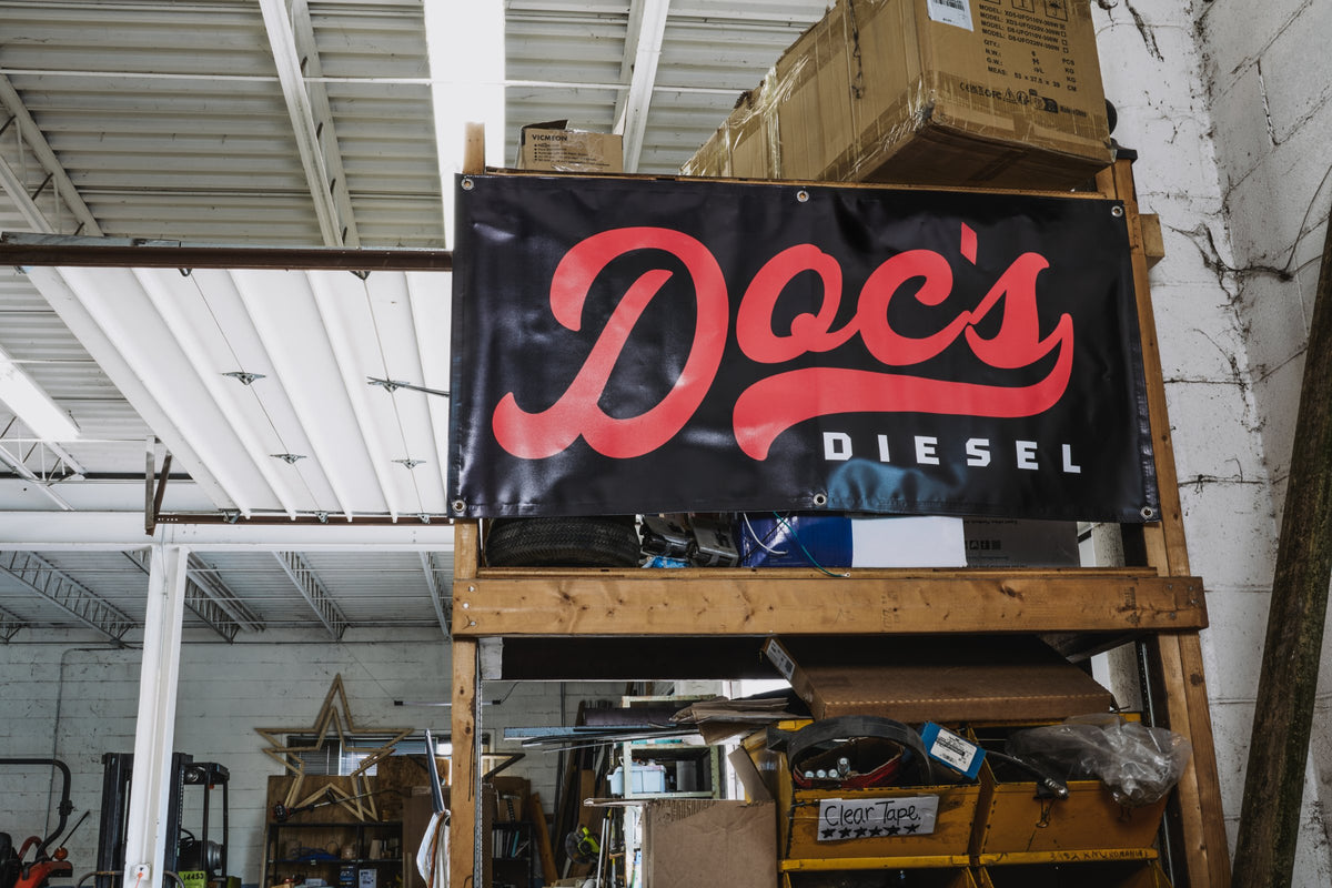 The Doc's Diesel banner hanging in the shop