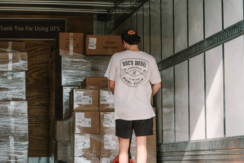 Unloading a trailer of inbound stock at Doc's Diesel