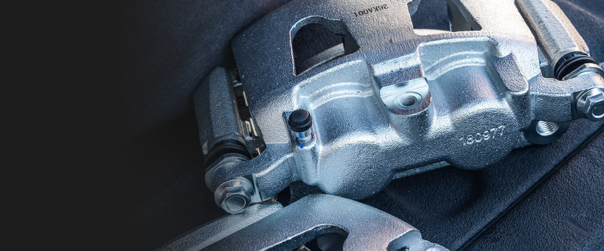 A pair of new zinc-plated Doc's Diesel brake calipers